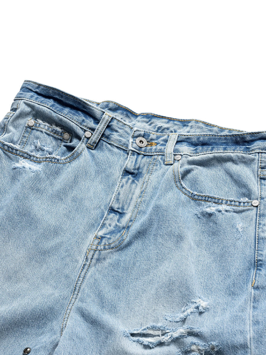 DISTRESSED BAGGY DENIM PANTS