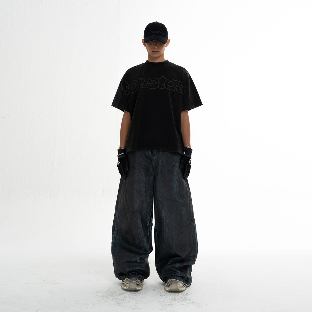 COATED SUPER BAGGY JEANS