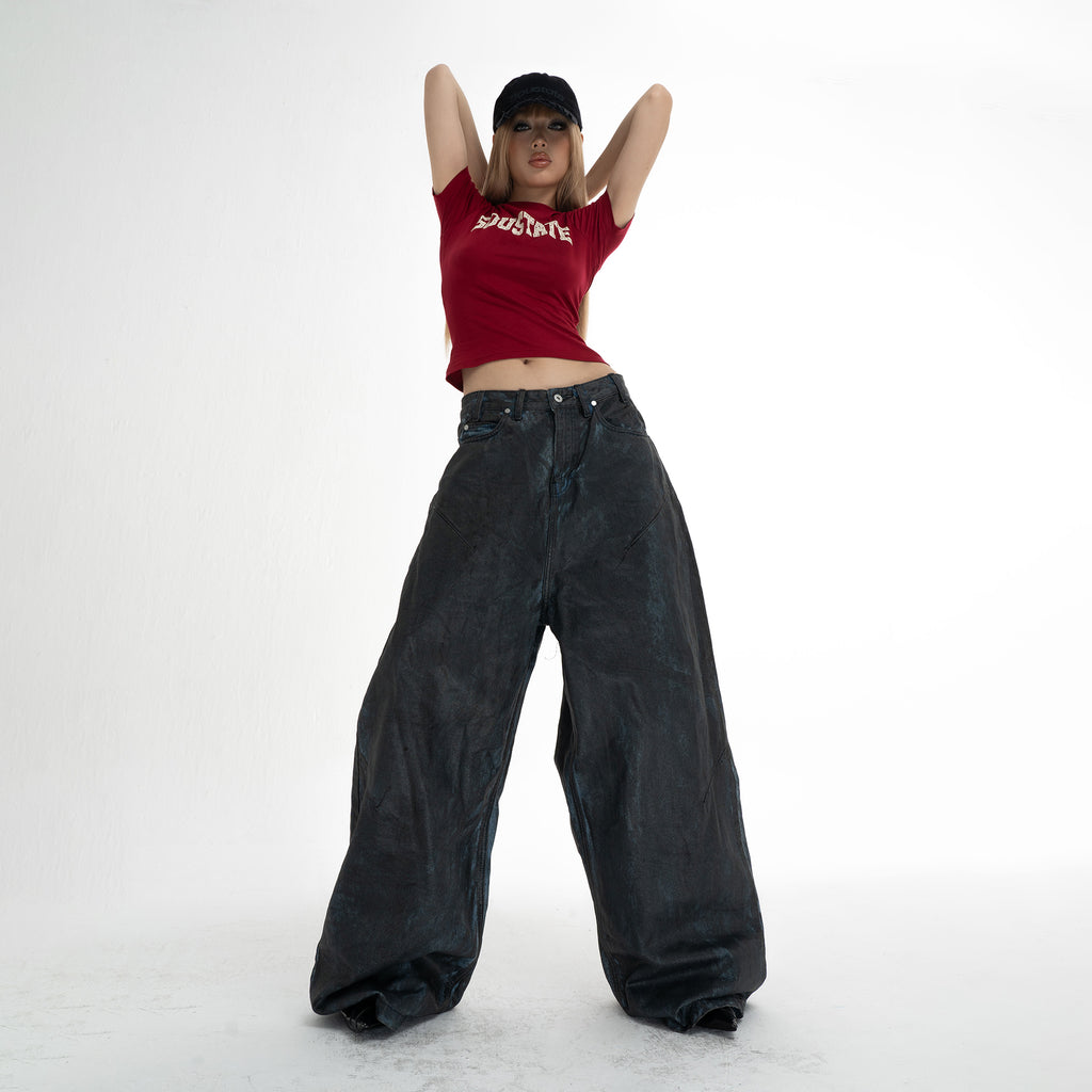 COATED SUPER BAGGY JEANS